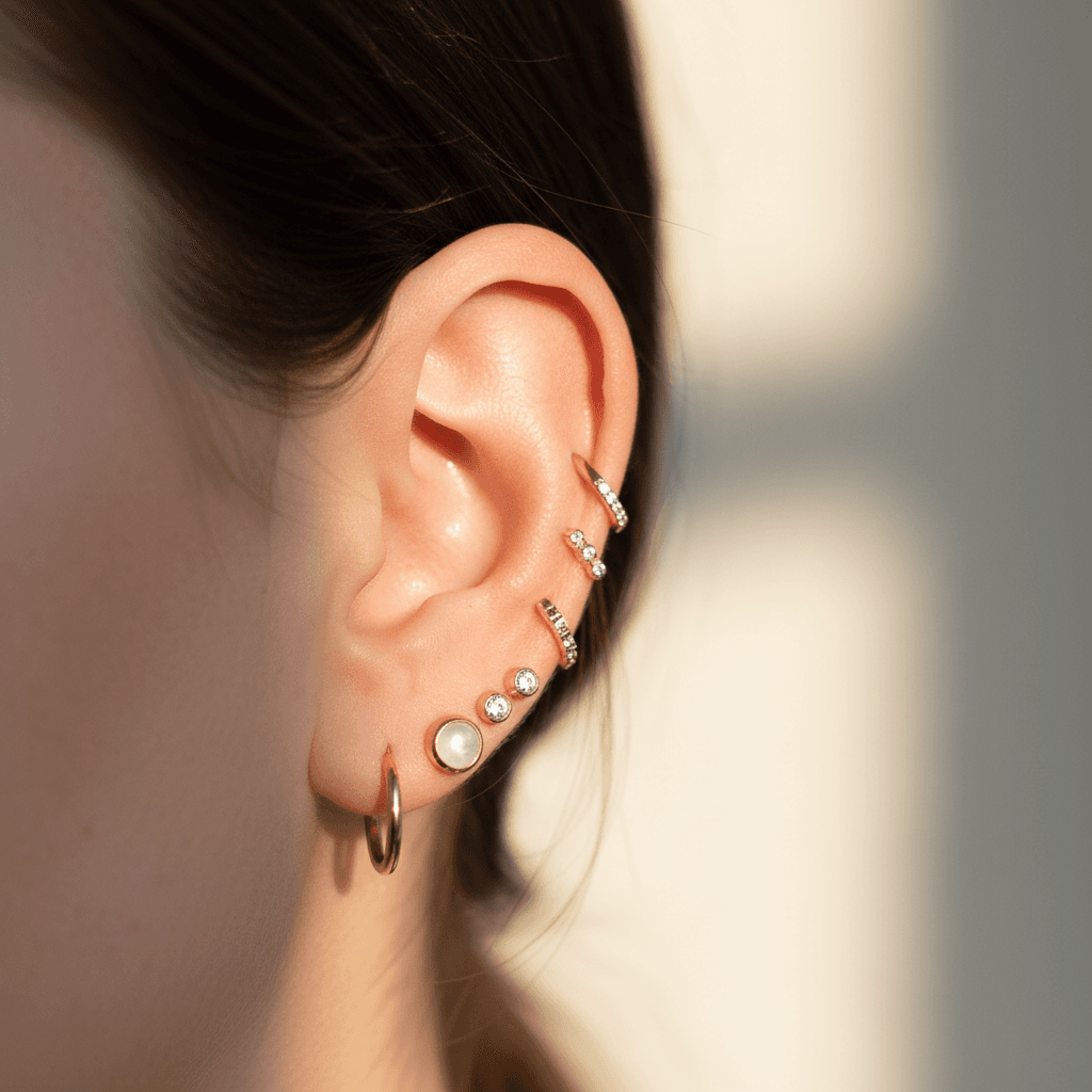 Ear piercings including cartilage and lobe placements